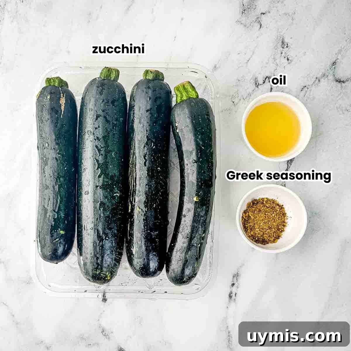 How to Smoke Zucchini on a Pellet Grill 3 Labeled ingredients shot for smoked zucchini slices, featuring fresh zucchini, olive oil, and Greek seasoning, all neatly arranged and clearly labeled, ready for preparation.