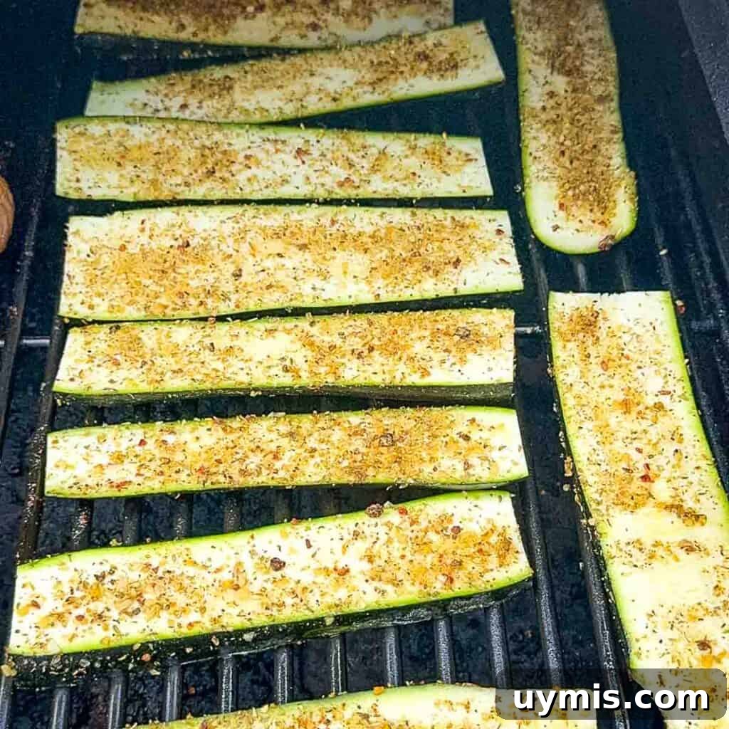 How to Smoke Zucchini on a Pellet Grill 7 Placing the zucchini halves on the grill in a single layer.