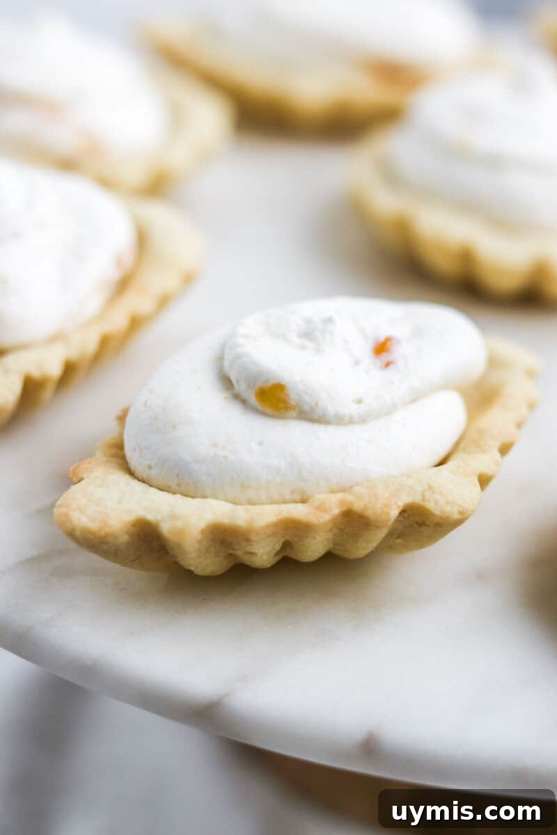 Multekrem: Norwegian Cloudberry Cream Recipe 2 Close up of an almond tart filled with Clouberry Cream.