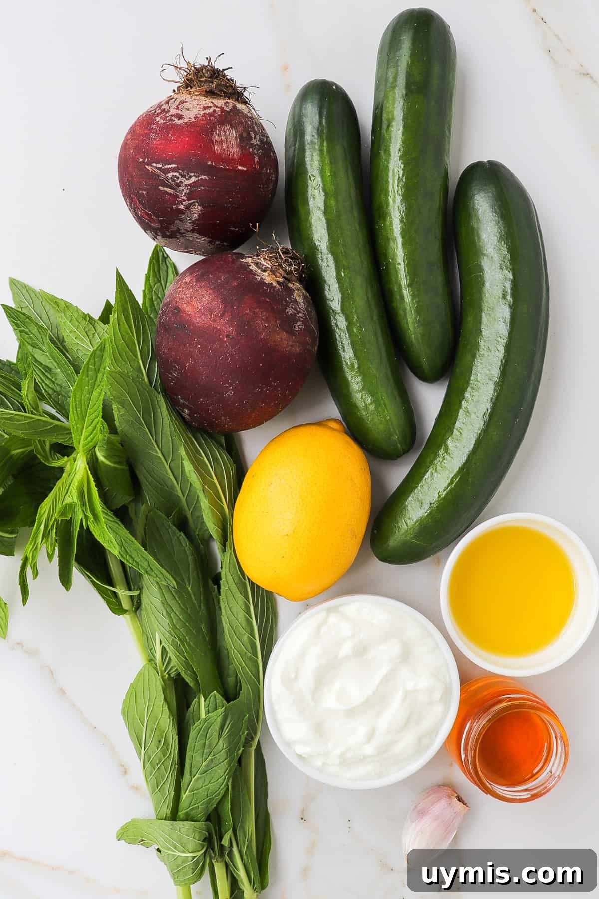 Cucumber and Beetroot Salad Recipe 4 Ingredients shown to make the salad.