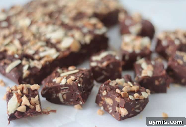 squares of fudge on parchment paper