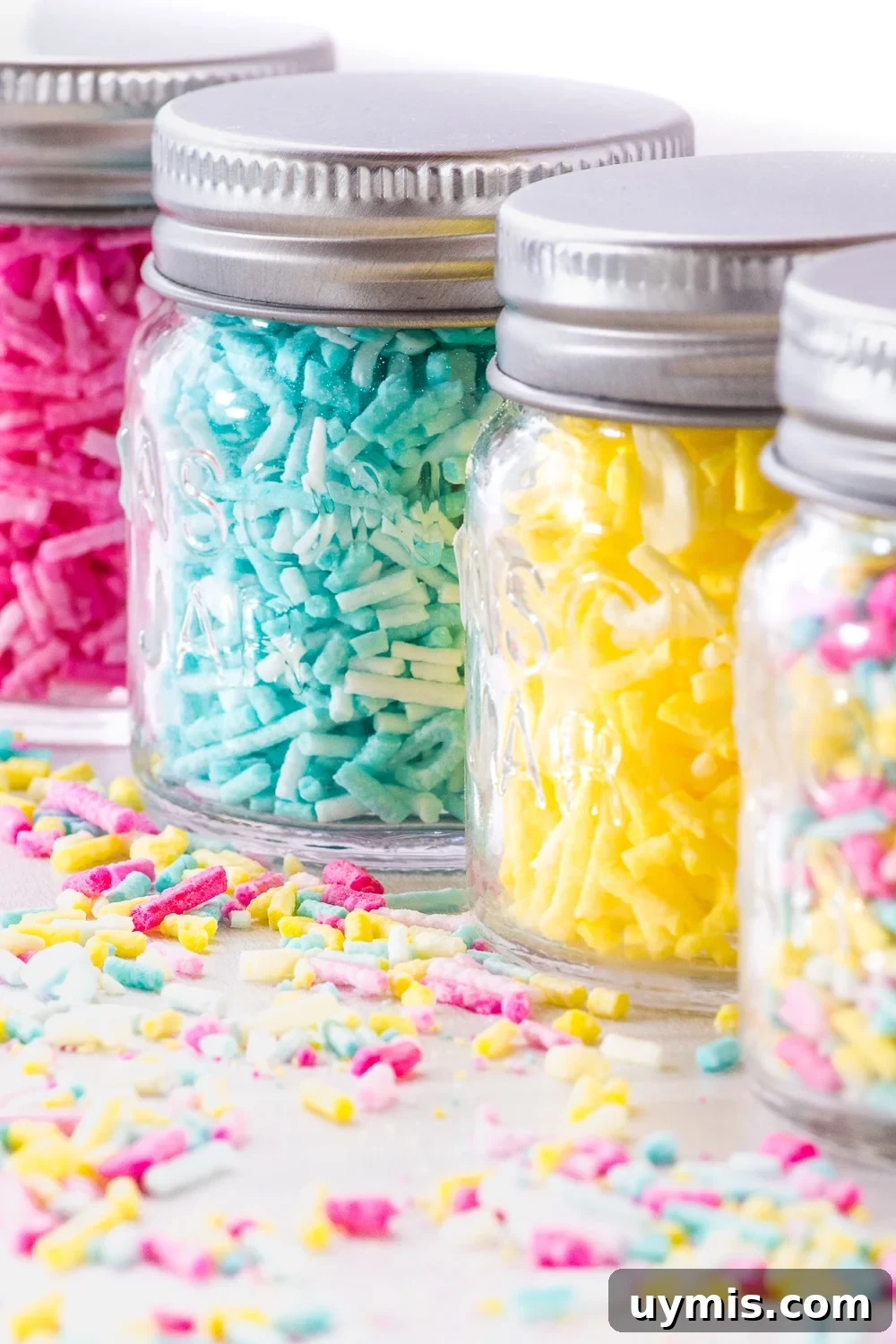 Keto Sugar Free Birthday Cake Everyone Will Love 6 Jars filled with colourful homemade sprinkles