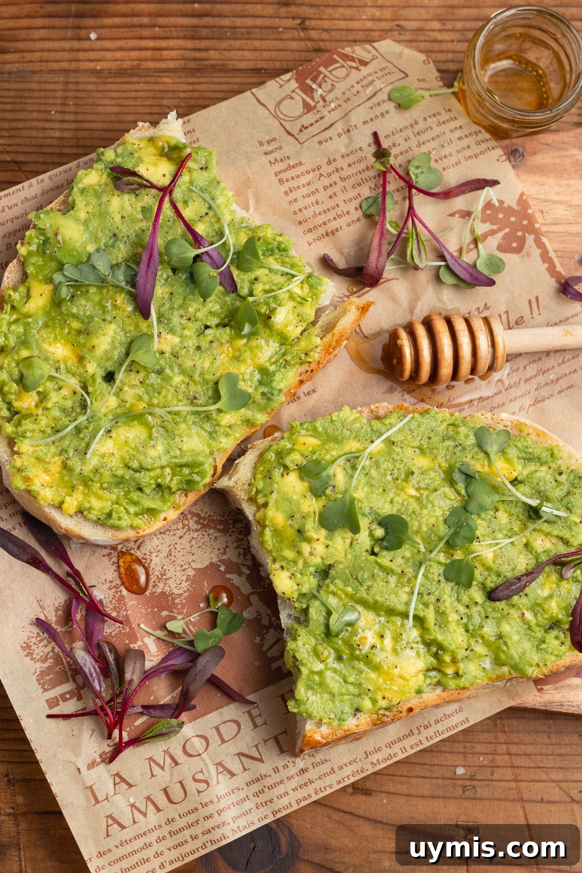 Hot Honey Avocado Toast Recipe 2 This is a picture of two avocado toasts.