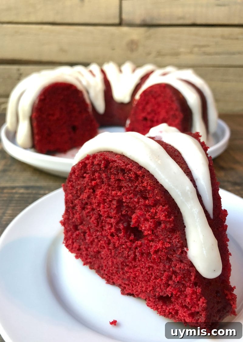 Red Velvet Bundt Cake with Cinnamon Cream Cheese Glaze Slice of Red Velvet Bundt Cake