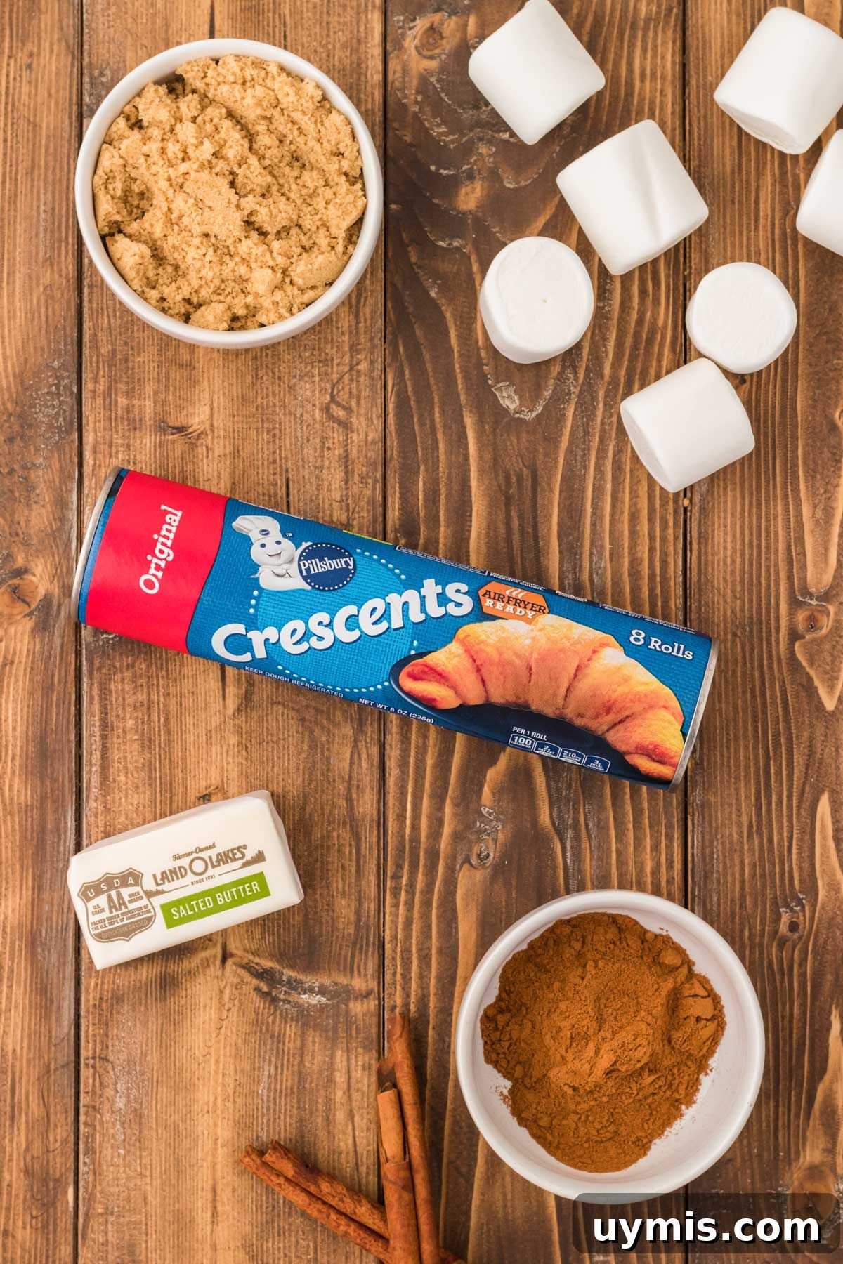 Easter Resurrection Rolls with Marshmallow Center 3 Ingredients to make resurrection rolls on a wooden table.