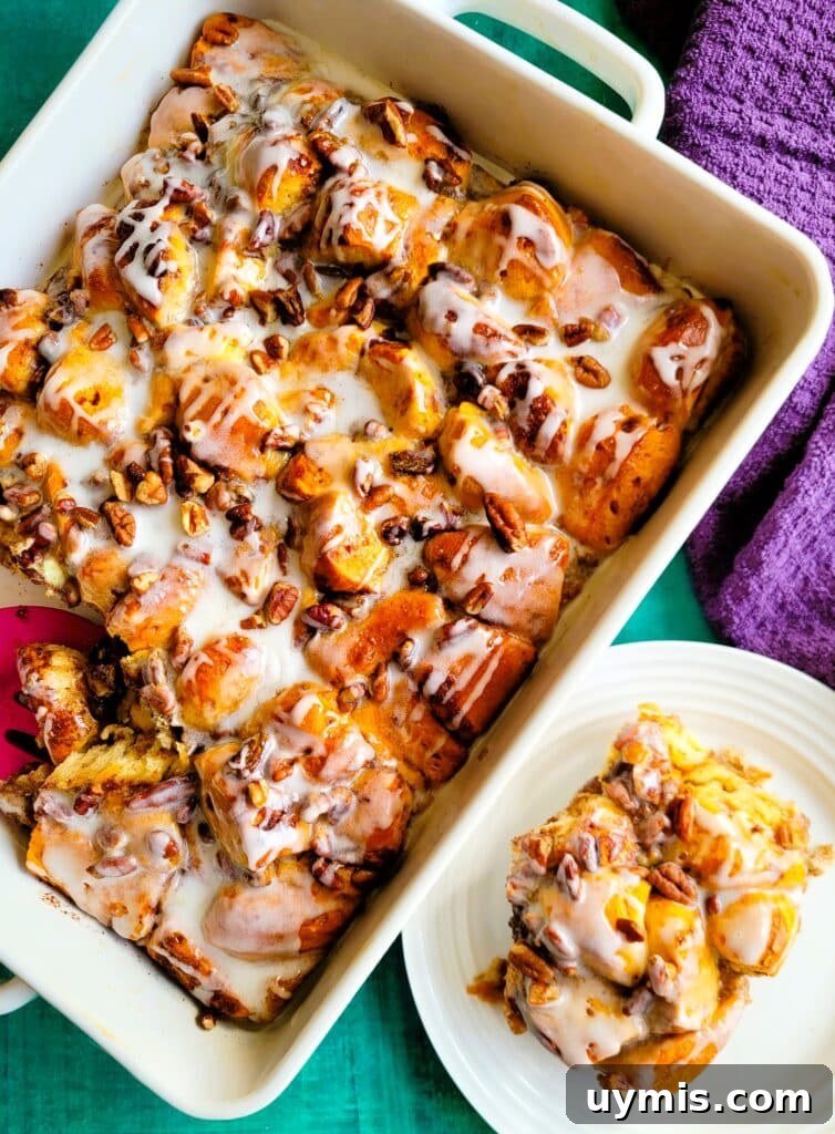 An easy cinnamon roll breakfast casserole made with canned cinnamon rolls, maple syrup, pecans, and vanilla custard, perfect for holidays and family weekends.
