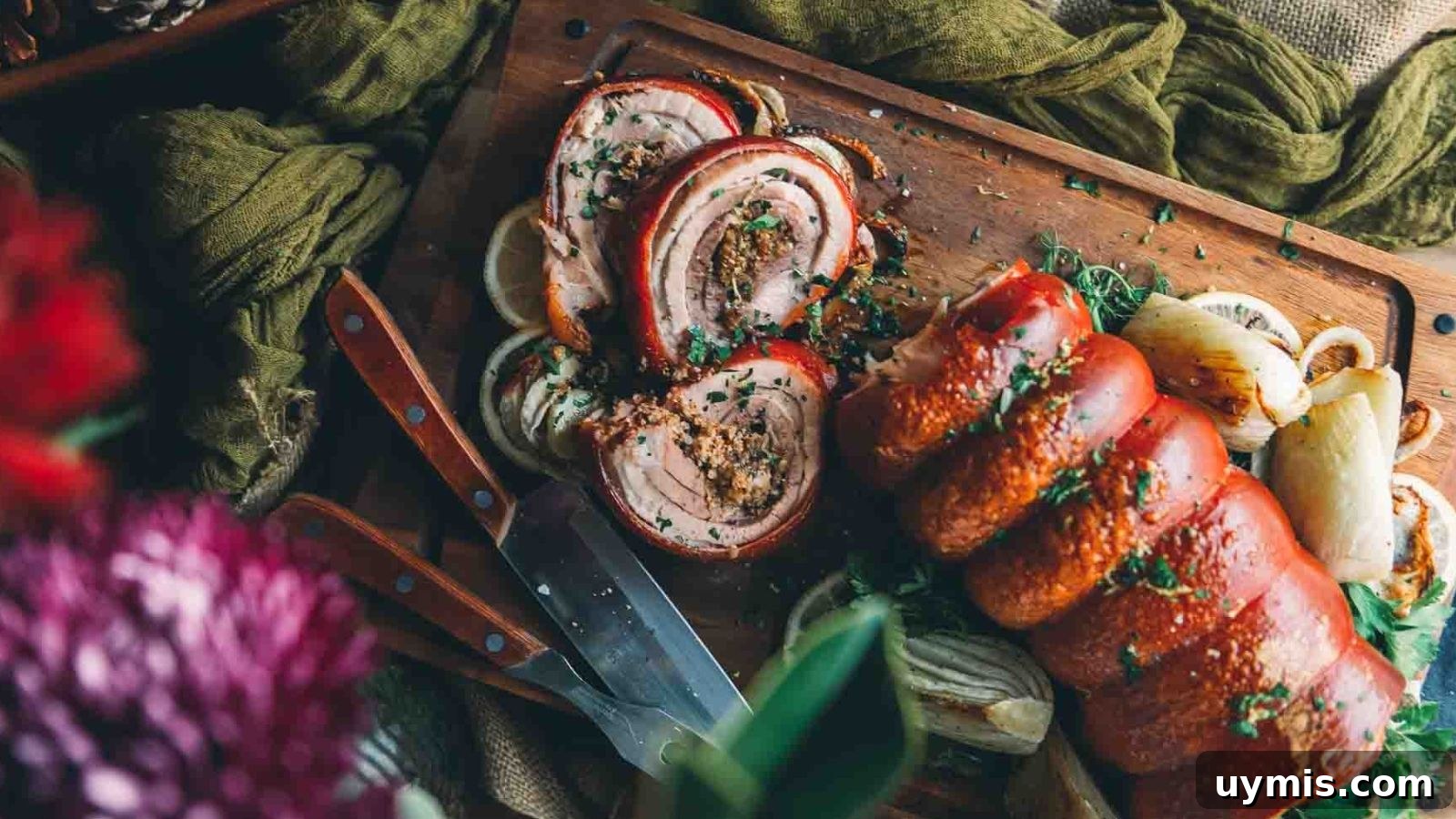 21 Elegant Easter Main Courses for a Stunning Holiday Table 4 Roasted porchetta with crispy crackling and rolled seasoned pork sliced thick.