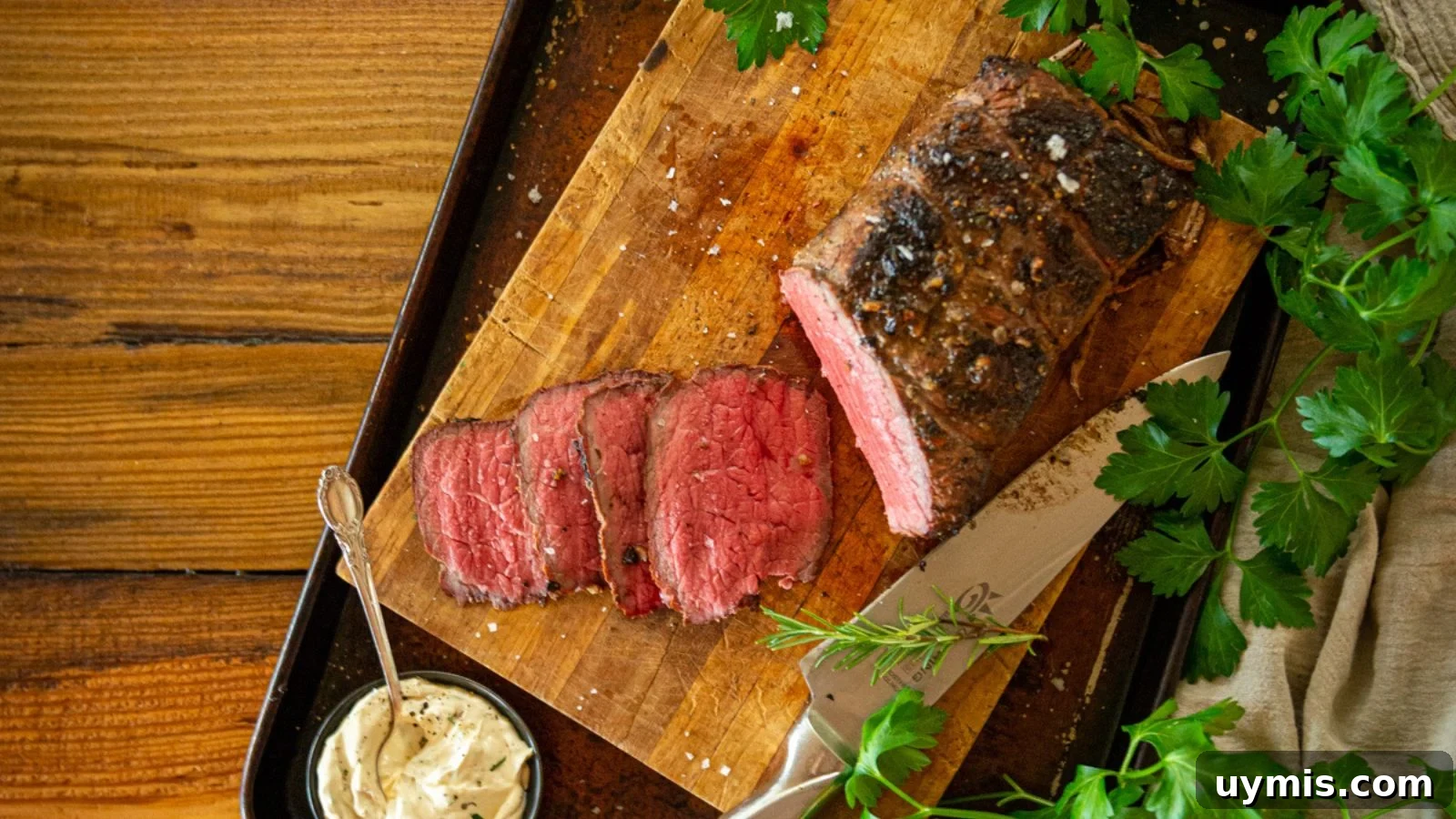 21 Elegant Easter Main Courses for a Stunning Holiday Table 9 Roast beef smoked until bark forms and sliced thick showing juicy red interior.
