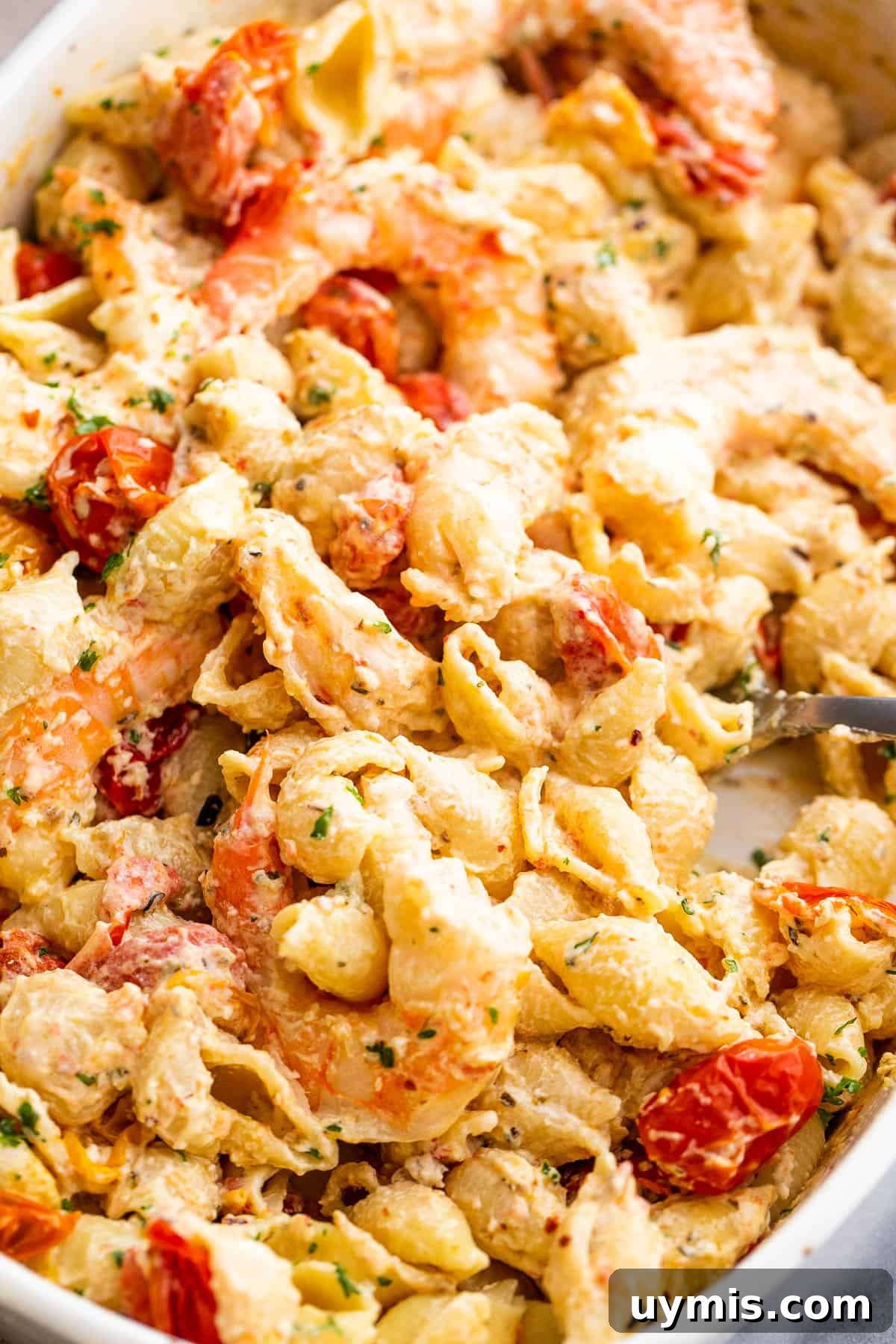 Creamy Baked Shrimp Pasta with Cream Cheese 3 shrimp and pasta tossed with a cream cheese sauce and cherry tomatoes