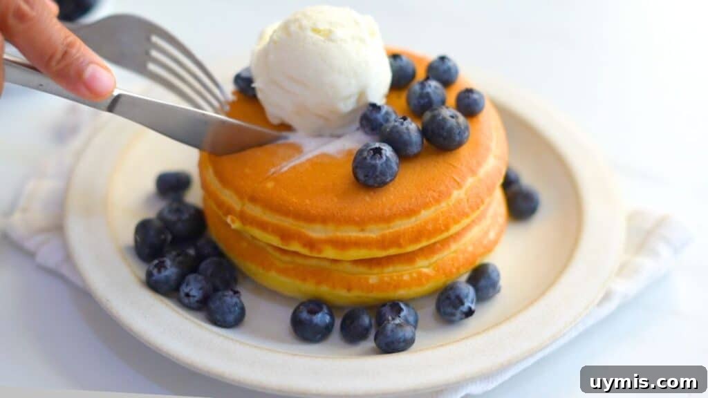 Fluffy Nutella-Stuffed Pancakes with Gooey Center 2 nutella stuffed pancakes
