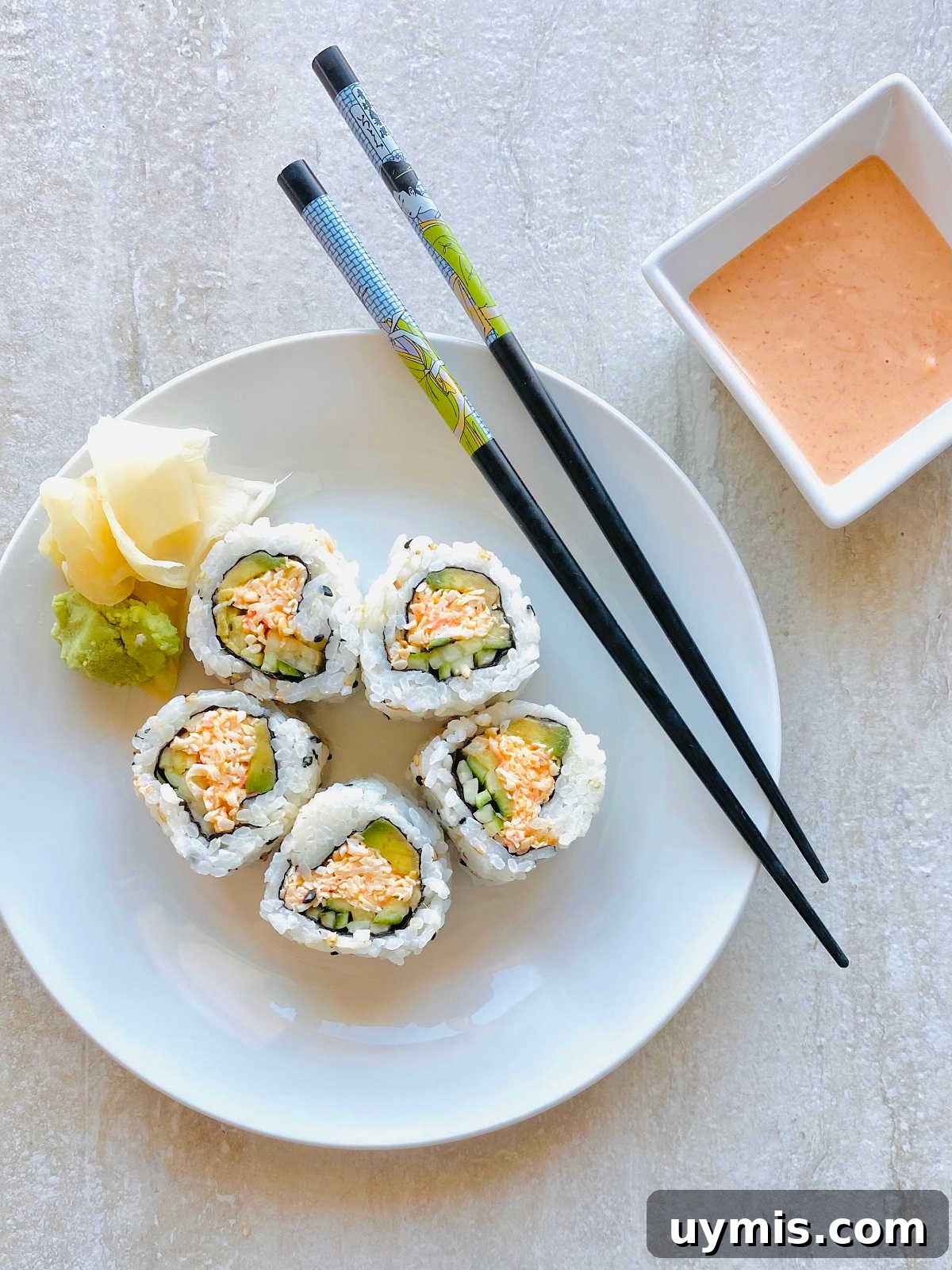 How to Make Spicy Kani Roll — Japanese Crab Sushi 4 spicy crab roll sushi on a plate with sushi