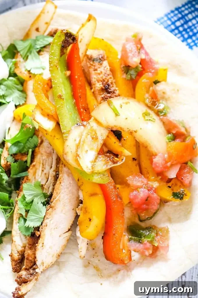 chicken fajita recipe full of vegetables and grilled chicken