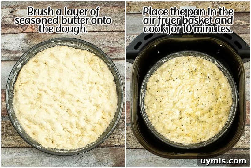 Crispy Air Fryer Focaccia Bread Recipe 6 Dough seasoned with butter in a pie pan and pan placed into air fryer basket.